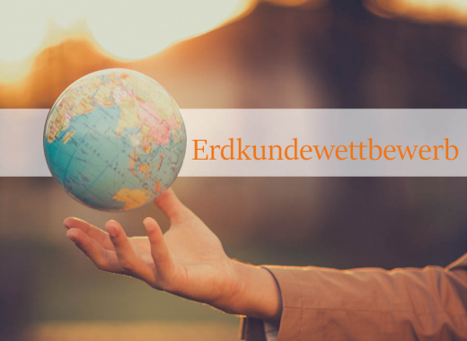 Atlas und Erdkundebuch im Kopf